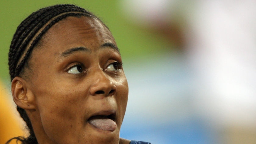 Marion Jones reflects after a 100m run