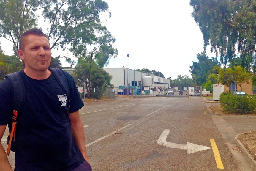 Chris Spencer outside his work premises