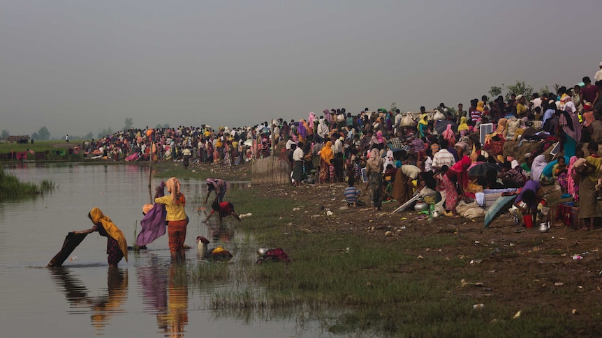 Rohingya Muslims wait for permission to move towards refugee camps