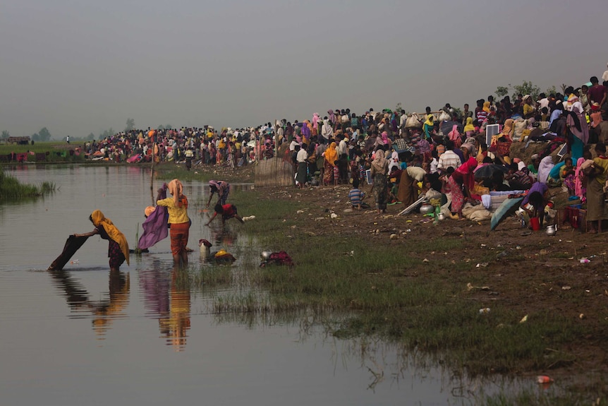 Rohingya Muslims wait for permission to move towards refugee camps