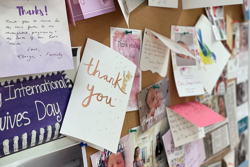A colourful array of thank you cards on on a cork notice board.