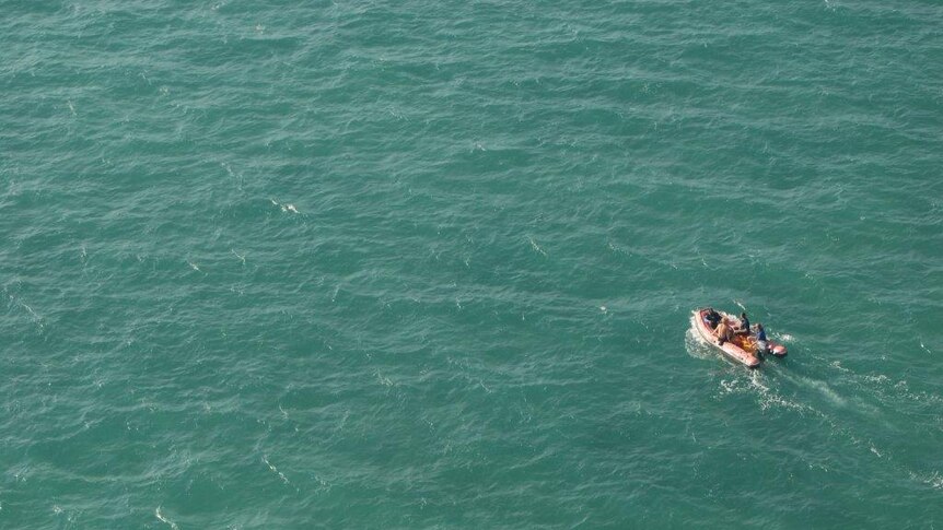 Two fisherman are transported from the navigation mast