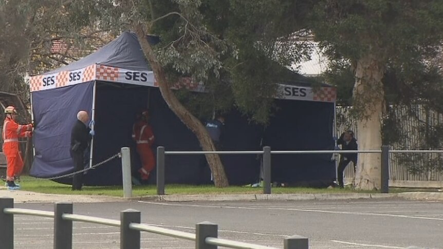 A police tent at a Brunswick West reserve where a man was found dead.