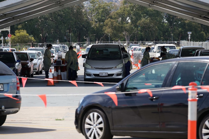Cars lining up at the Victoria Park coronavirus testing clinic.