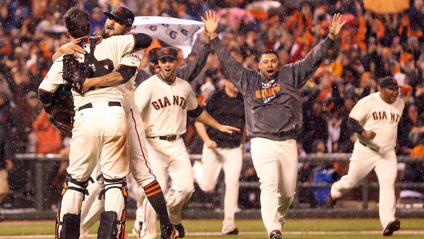 San Francisco Giants players celebrate their team's win