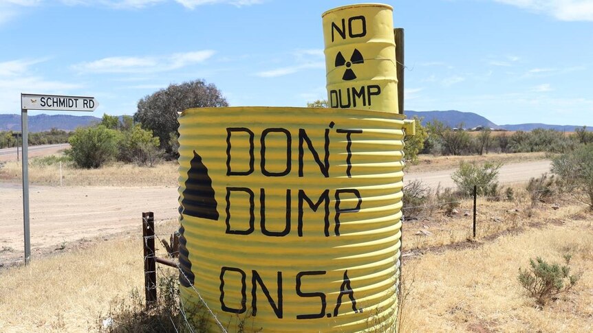 A yellow tank with 'don't dump on SA' written on it.