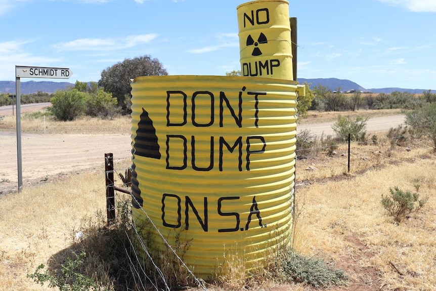 A yellow tank with 'don't dump on SA' written on it.