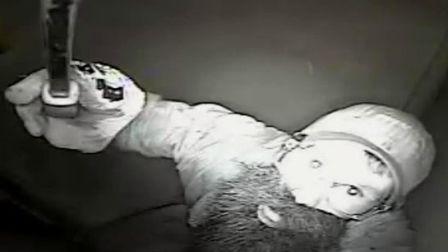 Bearded burglar captured on CCTV