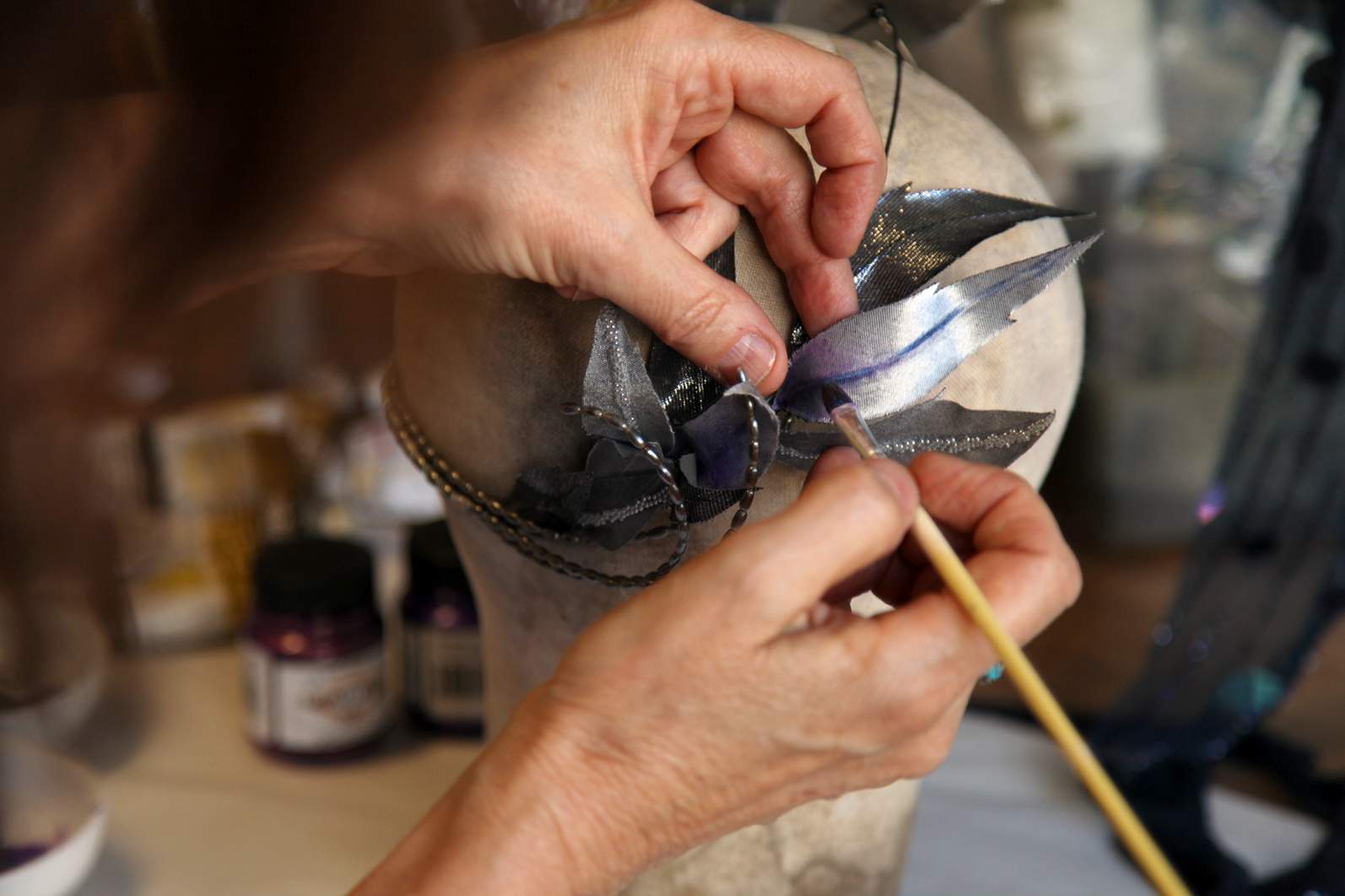 Miss Fisher headpiece being painted