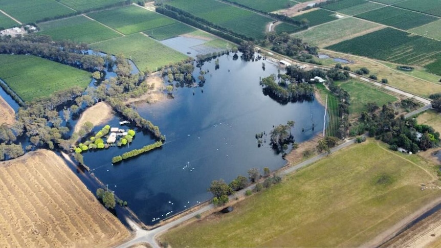 An aerial shot of a water inundated property 