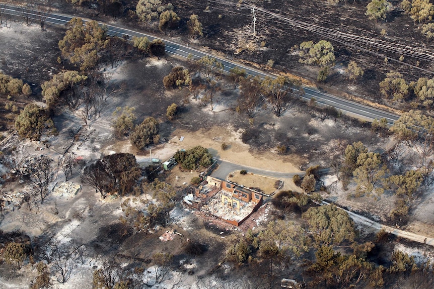Homes damaged by bushfire seen from above between Dunalley and Boomer Bay, Tasmania