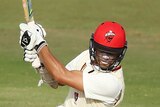 Jake Weatherald of the Redbacks bats in front of Rob Quiney