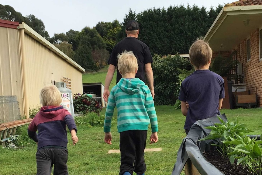 Lyndon Hunter and three children, north west Tasmania, 2020.