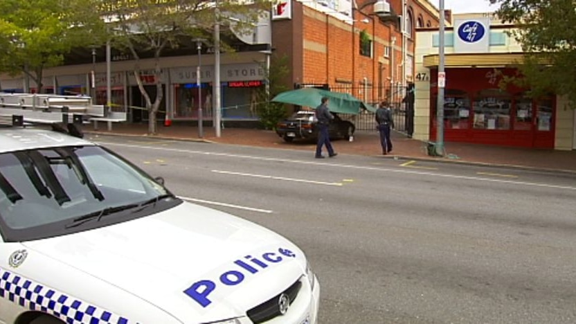 Charges laid after three people 'run down' in Adelaide street