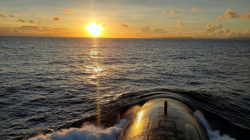 A submarine going underwater, and a sunset.