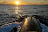 A submarine going underwater, and a sunset.