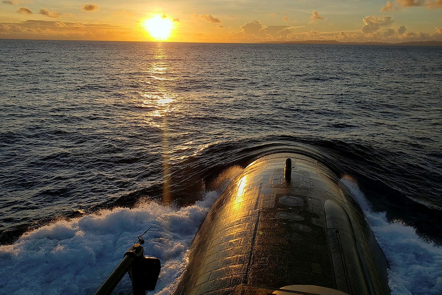 A submarine going underwater, and a sunset.