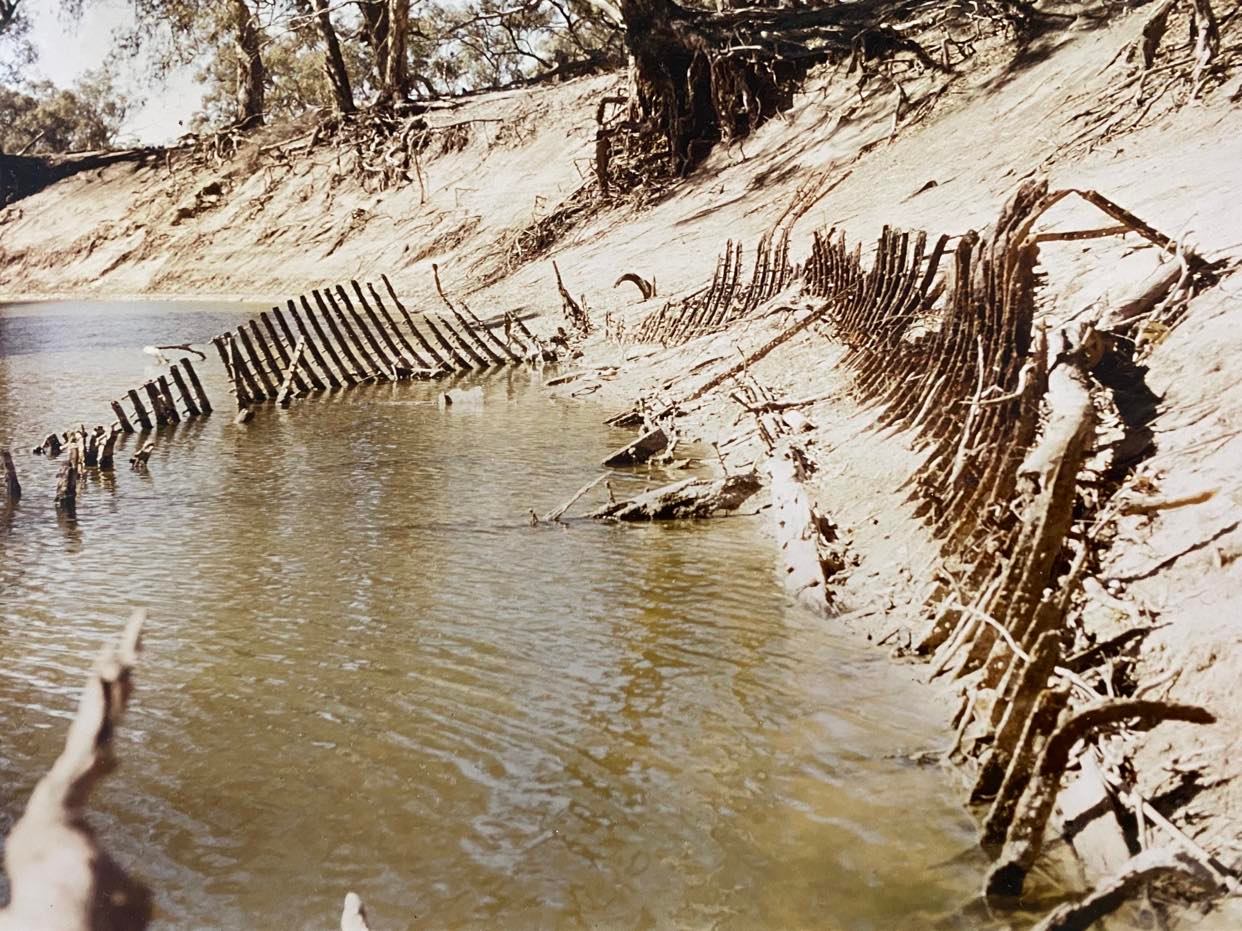 Low river with party submerged wreck of the PS Rodney