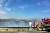 Firefighters on the side of the Midlands Highway south of Oatlands