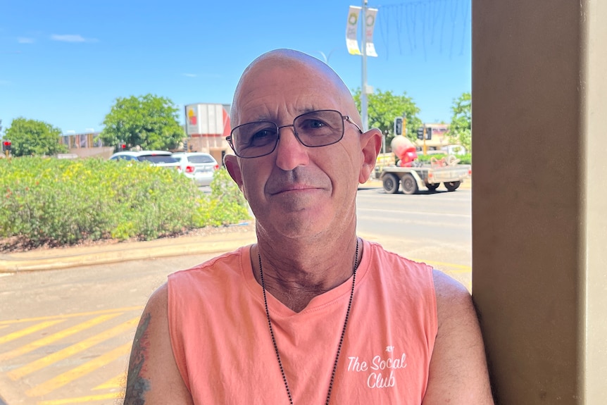 a bald man in glasses wearing a pink tank top. Ausnew Home Care, NDIS registered provider, My Aged Care