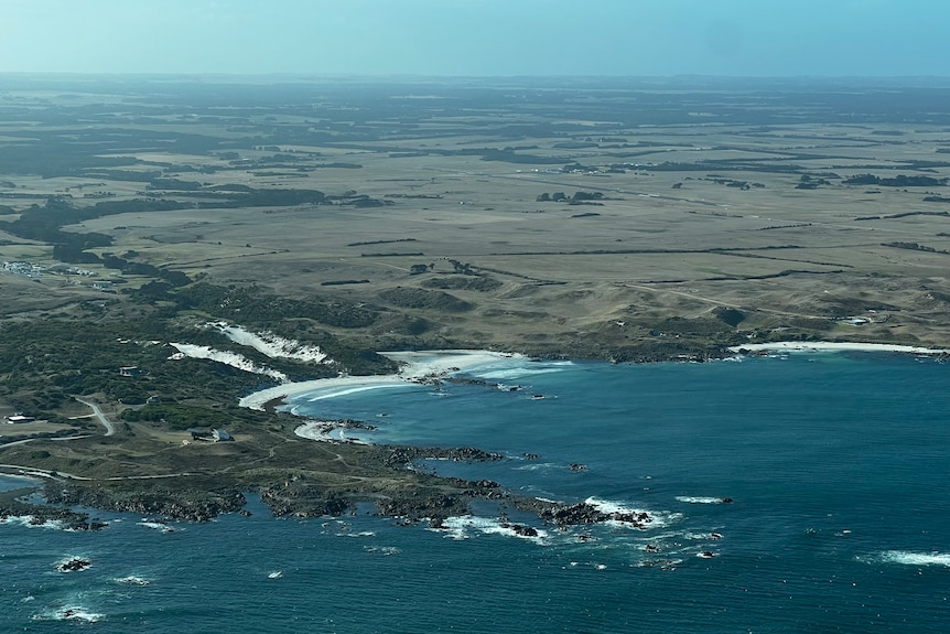 Aerial view over rural land and coastline of King Island, Tasmania