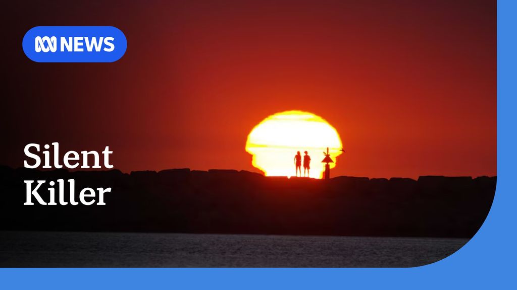 Silent Killer: Two people standing side-by-side silhoueted against the sun low on the horizon.