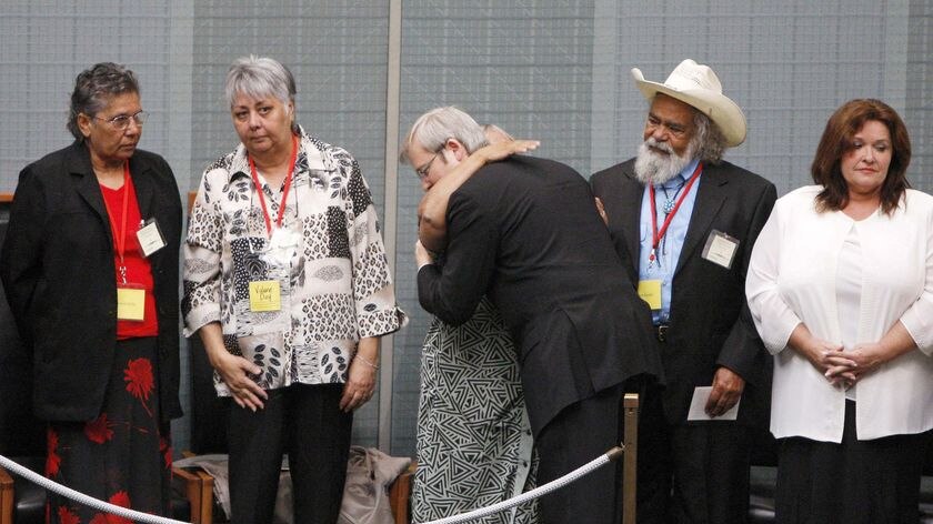 Kevin Rudd embraces Stolen Generations members.