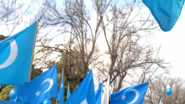 Dozens of ethnic Uighurs staged a protest outside the Chinese Consulate in Melbourne.