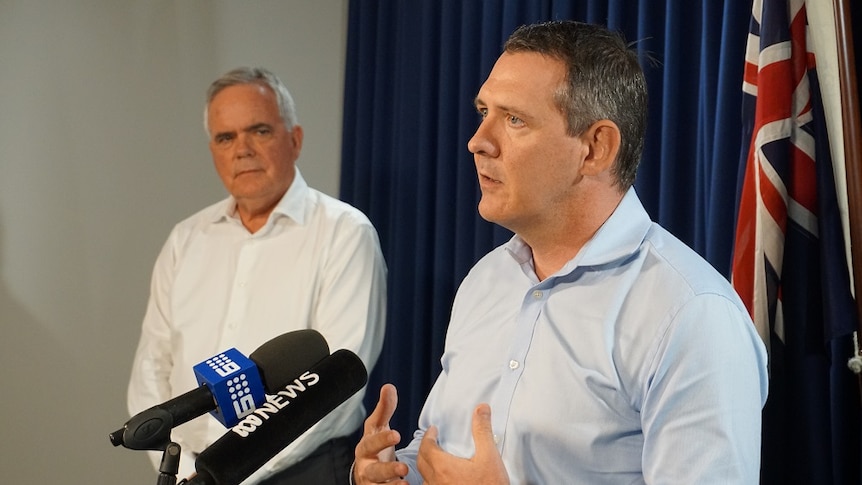 John Langoulant and Michael Gunner talk at a press conference