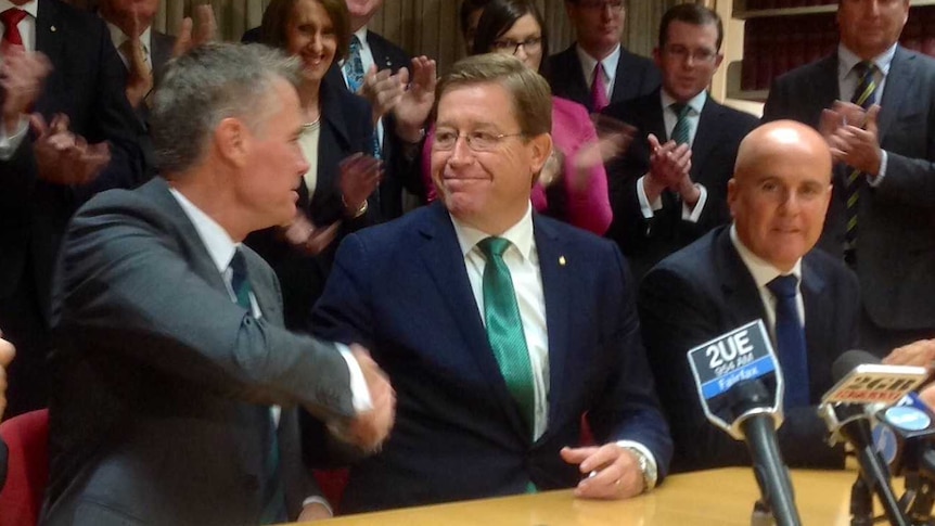 Troy Grant is congratulated by Andrew Stoner after being elected as NSW Nationals Leader