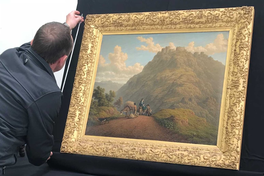 John Glover painting being measured at auction
