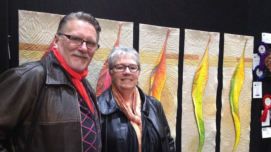 Trevor and Beth Reid with their art quilt