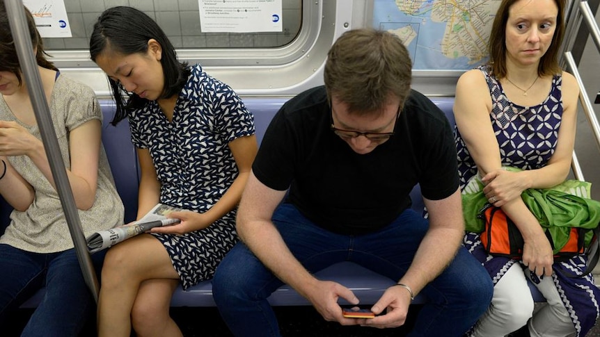 A man guilty of manspreading, taking up room on public transport