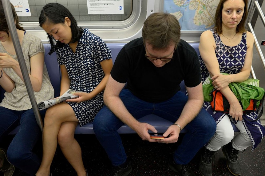 A man guilty of manspreading, taking up room on public transport