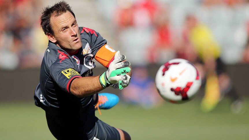 Adelaide's Eugene Galekovic makes a save against Melbourne Heart on January 25, 2014.