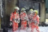 Fire fighters covered in foam at Fiskville training base