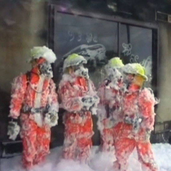 Fire fighters covered in foam at Fiskville training base