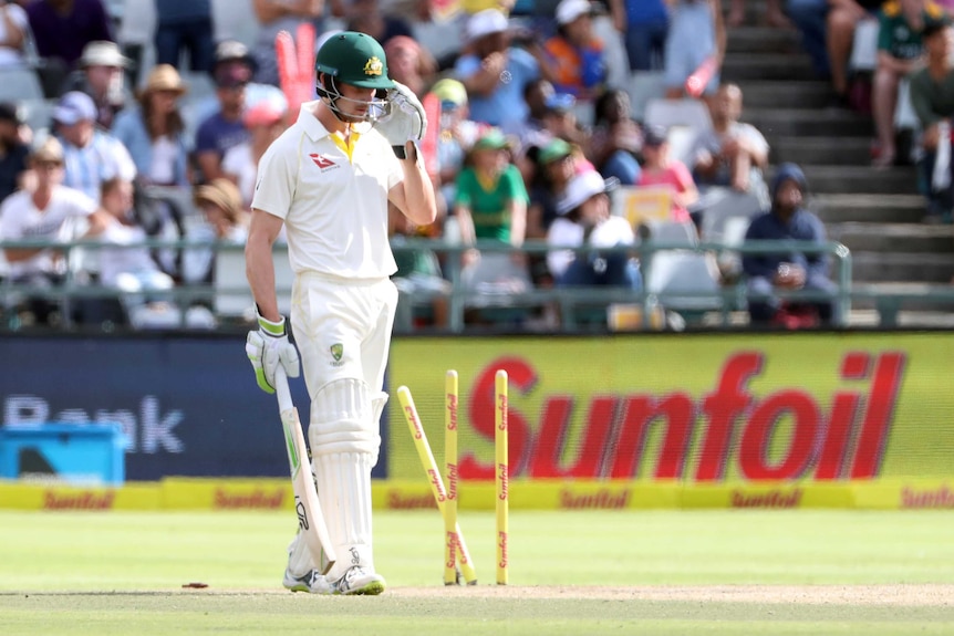 Cameron Bancroft stands in front of his stumps after being dismissed on day four in Cape Town.