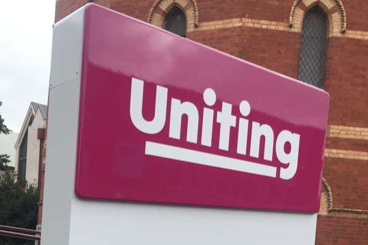 a red sign for 'uniting' outside the Ballarat office