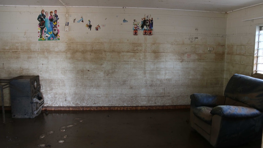 The high watermark of flooding seen on the wall of this Daly River residence.