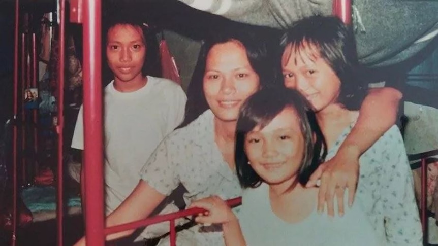 Dai Le (at far right) with her family in a Hong Kong refugee camp.