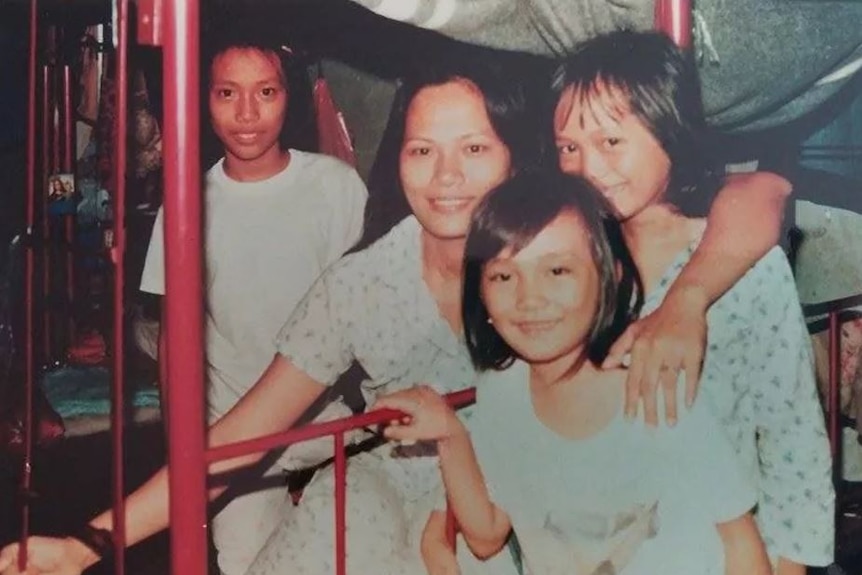 Dai Le (at far right) with her family in a Hong Kong refugee camp.