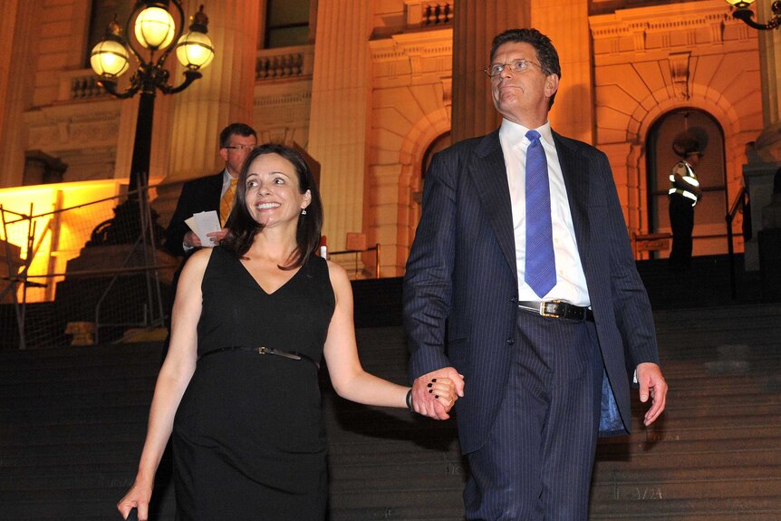 Former Victorian premier Ted Baillieu leaves state parliament with his wife Robyn