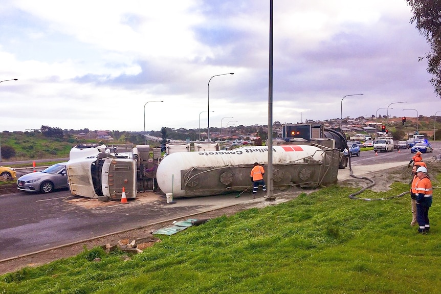 A truck lies on its side