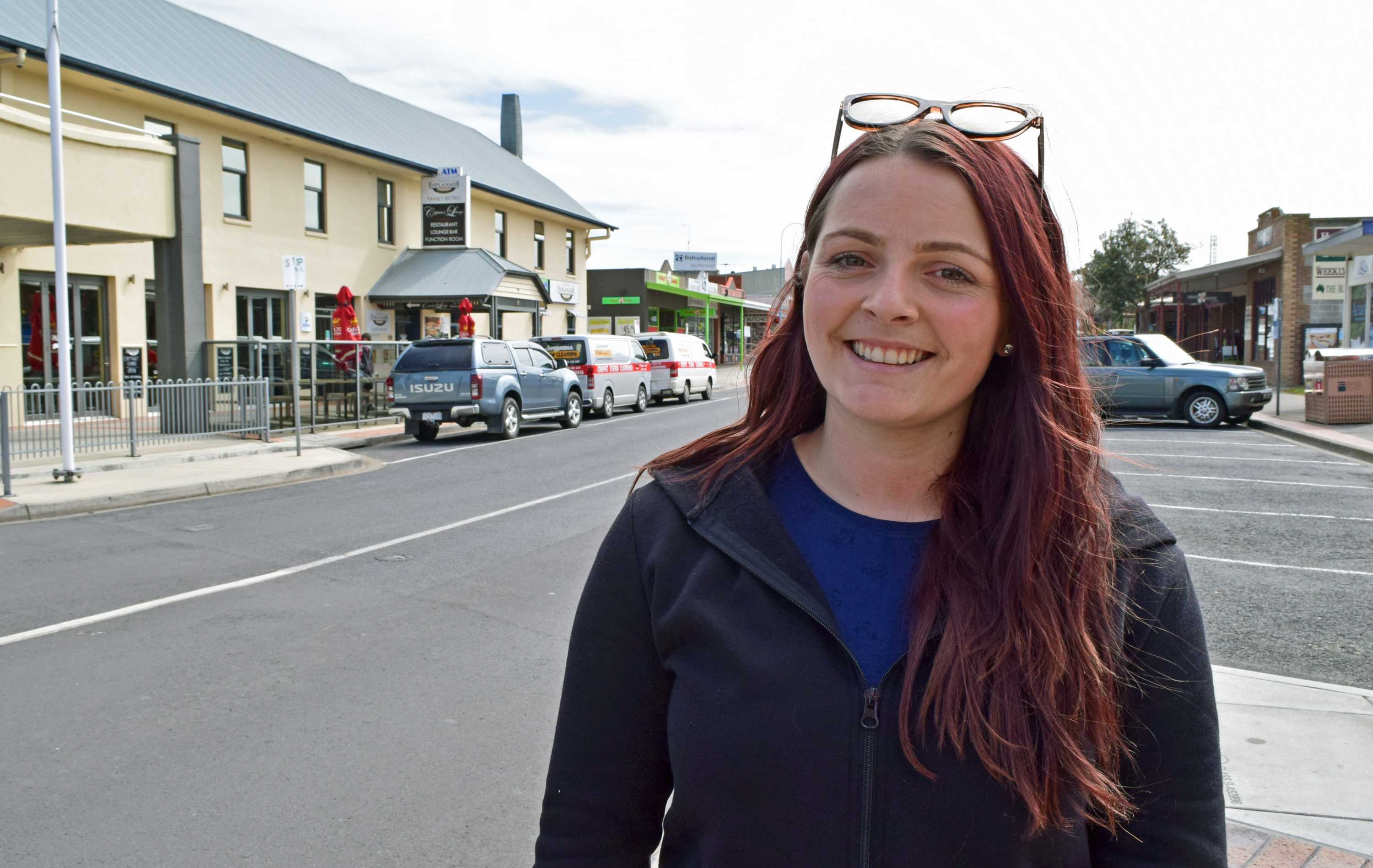 Rebecca Slavin standing in the main street of Inverloch, South Gippsland.