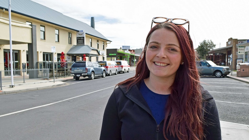 Rebecca Slavin standing in the main street of Inverloch, South Gippsland.