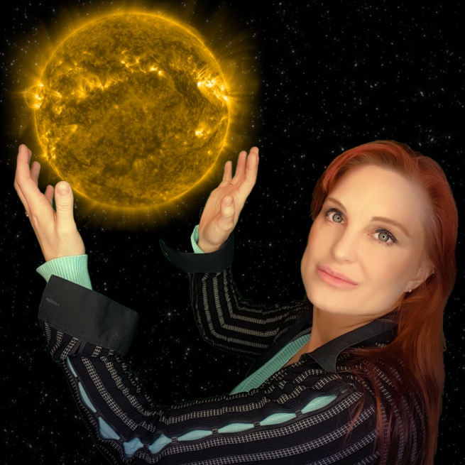 A woman with blond hair holds up a graphic of the Sun against a superimposed space background 