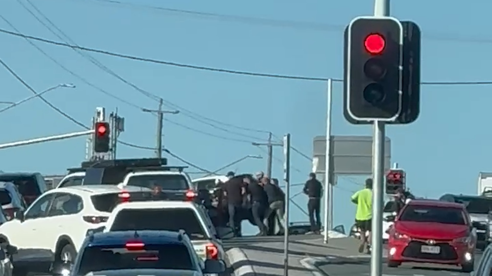 Motorcyclist who was trapped under car says he 'wouldn't be here' without bystanders