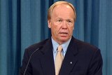 Peter Beattie has lost one of his ministers on day two of the Queensland election campaign.