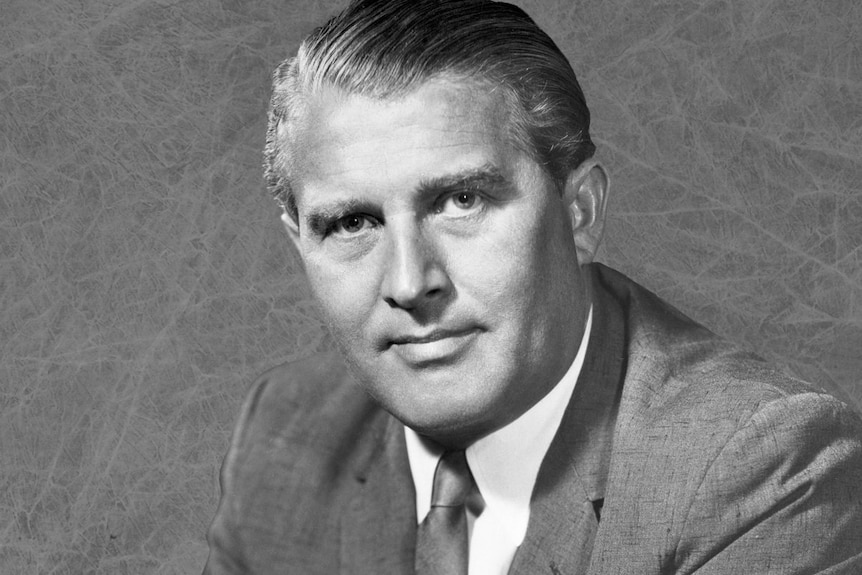 A black and white photo of rocket scientist Wernher von Braun.